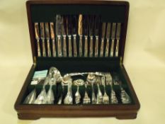 A MAHOGANY CASED CANTEEN OF GEORGE BUTLER CUTLERY