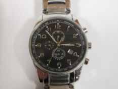 A BOXED GENTS FOSSIL WRISTWATCH WITH INSTRUCTIONS