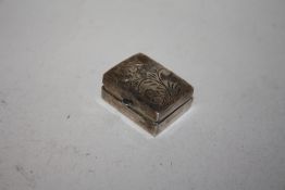 A STERLING SILVER STAMP HOLDER
