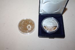 A COMMEMORATIVE 1 OZ FINE SILVER £2 COIN TOGETHER WITH A REPUBLIC OF LIBERIA PRINCESS DIANA