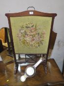 A MAHOGANY TAPESTRY FIRE SCREEN AND A SMALL BAROMETER (2)
