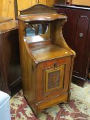 AN EDWARDIAN MAHOGANY AND MIRRORED COAL BOX H-92 CM W-39 CM