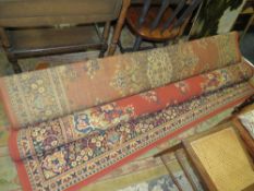 A LARGE WOOLLEN RUG ?? X ?? CM