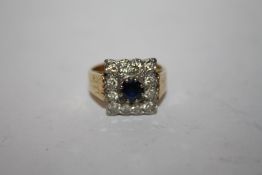 A YELLOW AND WHITE METAL DRESS RING SET WITH SAPPHIRE AND CZ STONES