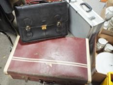 A VANGUARD HARD CASE TOGETHER WITH A SUITCASE AND A LEATHER SATCHEL