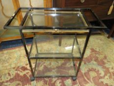 AN ART DECO STYLE GLASS AND METAL DRINKS TROLLEY W-70 CM