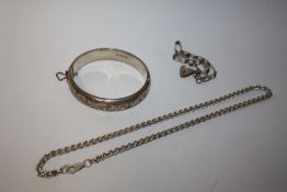 A HALLMARKED SILVER ENGRAVED BANGLE TOGETHER WITH A SILVER NECKLACE AND BRACELET