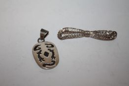A SILVER BOW TIE SHAPED BROOCH TOGETHER WITH A PENDANT