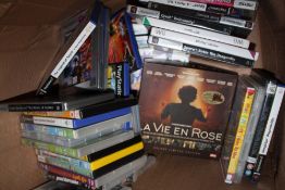 A BOX OF DVDS AND CONSOLE GAMES ETC.