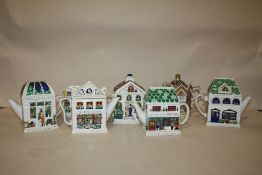 SIX NOVELTY WADE TEAPOTS TOGETHER WITH A SADLER EXAMPLE