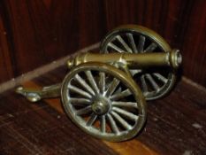 A BRASS DESK TOP MODEL CANNON