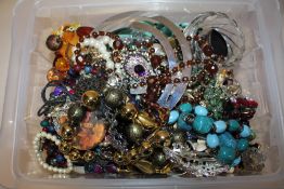A BOX OF COSTUME JEWELLERY