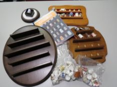 A COLLECTION OF THIMBLES AND DISPLAY STANDS