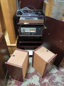 A VINTAGE THORENS TD-150 TURNTABLE TOGETHER WITH A QUAD 33 PRE AMPLIFIER HOUSED IN A WOODEN