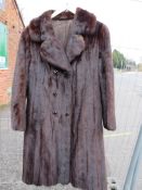 A VINTAGE RICH MAHOGANY BROWN MINK FUR COAT, fully lined, hook fasteners, front pockets, approx size