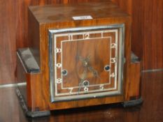 AN ART DECO STYLE WALNUT MANTEL CLOCK