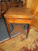 A REPRODUCTION MAHOGANY HANDKERCHIEF GAMES TABLE WITH LEATHER TOP