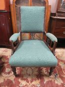 AN EDWARDIAN MAHOGANY ARMCHAIR