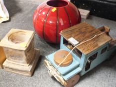 A CHILD'S PULL ALONG TOY CAR TOGETHER WITH A MODERN VASE AND A CANDLE STAND