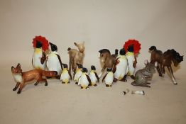 A COLLECTION OF BESWICK ANIMAL FIGURES TO INCLUDE PENGUINS, FOX, MOUSE ETC. A/F