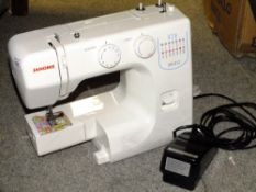 A MODERN JANOME JR1012 ELECTRIC SEWING MACHINE