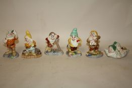 SIX ROYAL DOULTON DISNEY SHOWCASE COLLECTION SNOW WHITE AND THE SEVEN DWARVES FIGURES