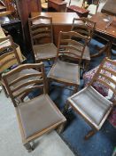 AN OAK BARLEY TWIST DINING TABLE AND SIX CHAIRS