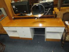 A RETRO DRESSING TABLE WITH CIRCULAR MIRROR W-96 CM TOGETHER WITH A PAIR OF BEDSIDE CHESTS (3)