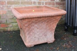 A LARGE TERRACOTTA PLANTER WITH BASKET EFFECT - MADE IN ITALY 66 X 66 X 50 CM