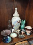 A LARGE HAND PAINTED GLASS LIDDED VASE TOGETHER WITH THREE ROYAL DOULTON CHARACTER JUGS, SYLVAC