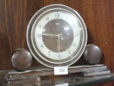 AN ART DECO METAMEC MANTEL CLOCK