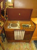 A RETRO WALNUT 'ARGOSY' RADIOGRAMME