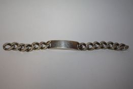 A GENT'S STERLING SILVER CURB LINK I.D. BRACELET