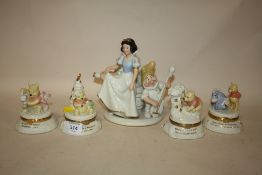 FOUR WINNIE THE POOH TRINKET BOXES BY LENOX, TOGETHER WITH A LENNOX SNOW WHITE AND THE SEVEN DWARVES