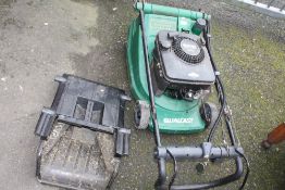 A SUFFOLK PUNCH 40SK PETROL LAWNMOWER