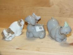 TWO NAO HIPPO FIGURES, TOGETHER WITH A NAO DOG FIGURE, ALL WITHOUT MODEL NUMBERS