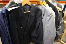 A COLLECTION OF GENTS CLOTHING TO INCLUDE A BUSH OVER COAT, SUITS ETC