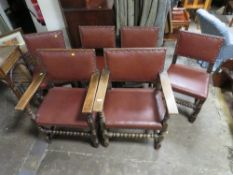 A SET OF SIX OAK STUDDED DINING CHAIRS (4+2)