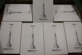 A TRAY OF BOXED BRIO SMART CLEAN ELECTRIC TOOTH BRUSHES