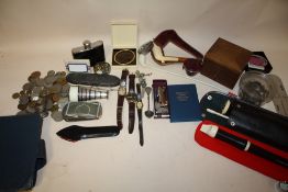 A BOX OF COLLECTABLES TO INCLUDE COINS, WRISTWATCHES, PIPES ETC.