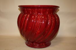 A LARGE RED CERAMIC MINTON JARDINIERE