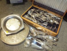 AN OAK CANTEEN WITH SILVER PLATED CUTLERY