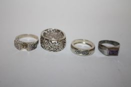 FOUR STERLING SILVER LADIES DRESS RINGS