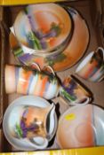 A TRAY OF NORITAKE 1920s SWAN LAKE / SUNSET PATTERN TEAWARE