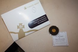 A JUBILEE MINT 'THE SAINT GEORGE AND THE DRAGON' SOLID 9 CARET GOLD COIN WITH CERTIFICATE