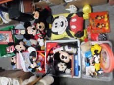 A LARGE QUANTITY OF MICKEY MOUSE RELATED COLLECTABLES TO INCLUDE SOFT TOYS