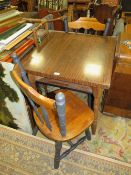 A MODERN SQUARE TABLE AND TWO CHAIRS
