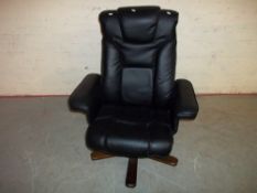 A FAUX LEATHER RECLINER SWIVEL CHAIR