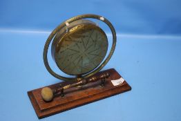 AN ANTIQUE BRASS GONG ON STAND