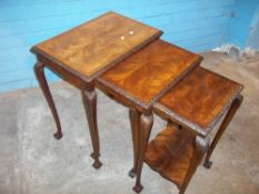 AN ANTIQUE INLAID NEST OF THREE TABLES WITH CABRIOLE CLAW AND BALL LEGS